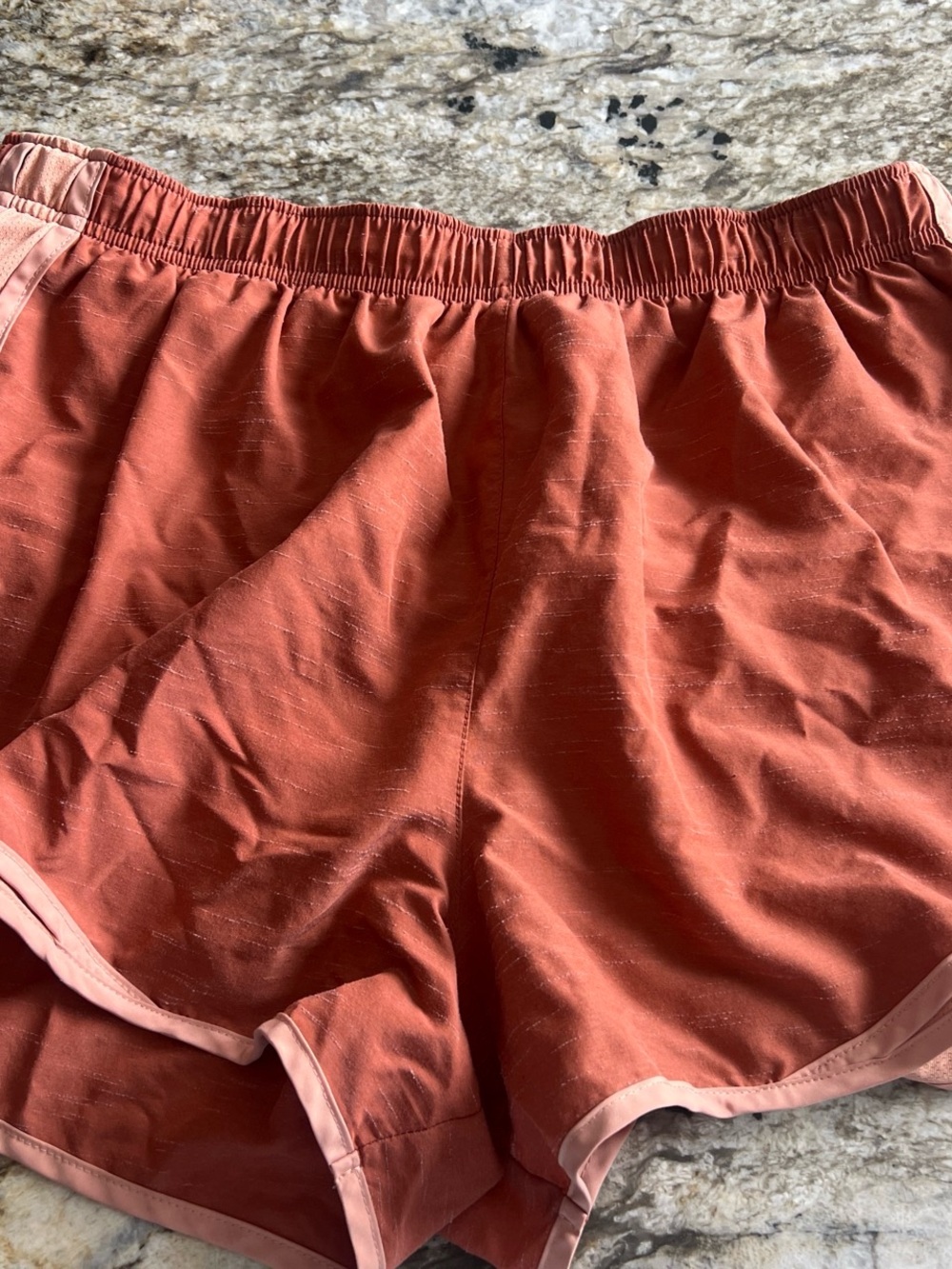 Nike Women's Rust Athletic Shorts with Light Pink Trim